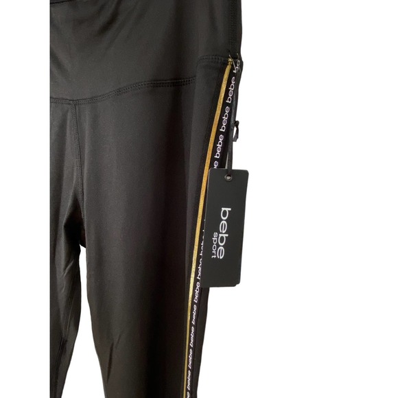Bebe leggings with gold striping down legs classic Bebe logo repeated - Picture 6 of 9